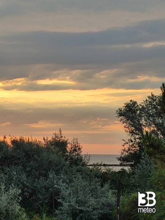 l 'alba tra le nuvole