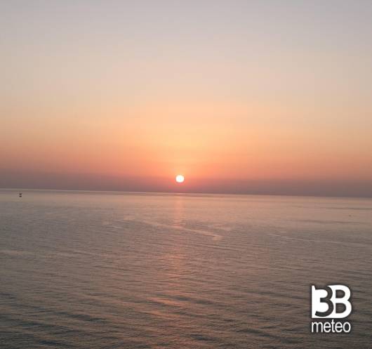 tramonto lido tre archi fermo