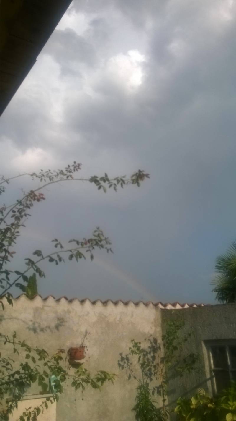 nuvole e arcobaleno a cisterna