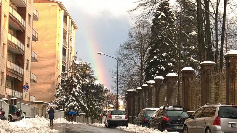 arcobaleno con neve