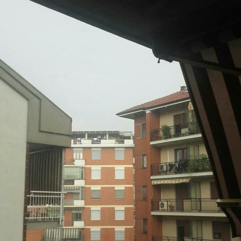 Torino con temporale e sole a mirafiori nord
